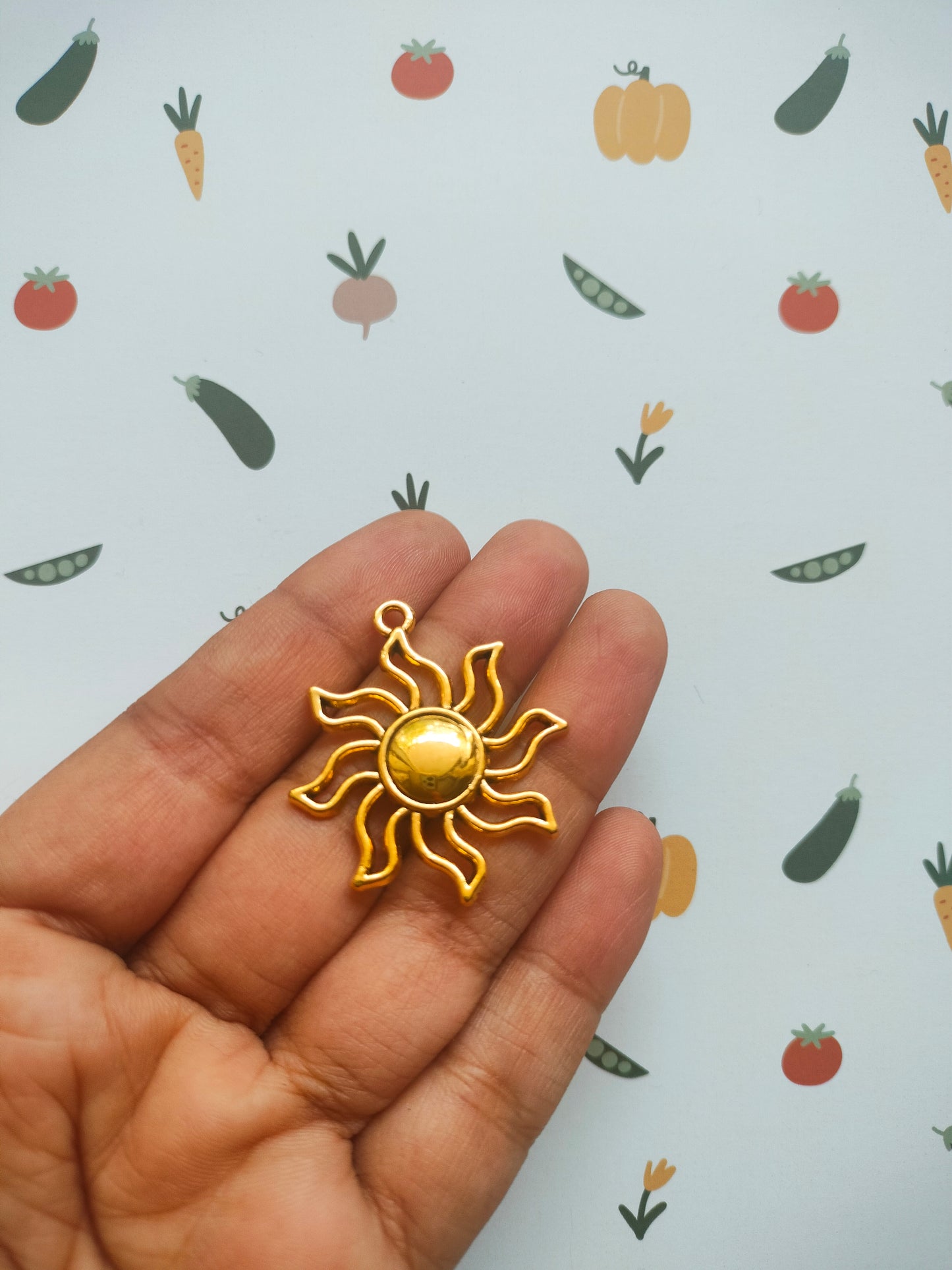 Sun charm connector
