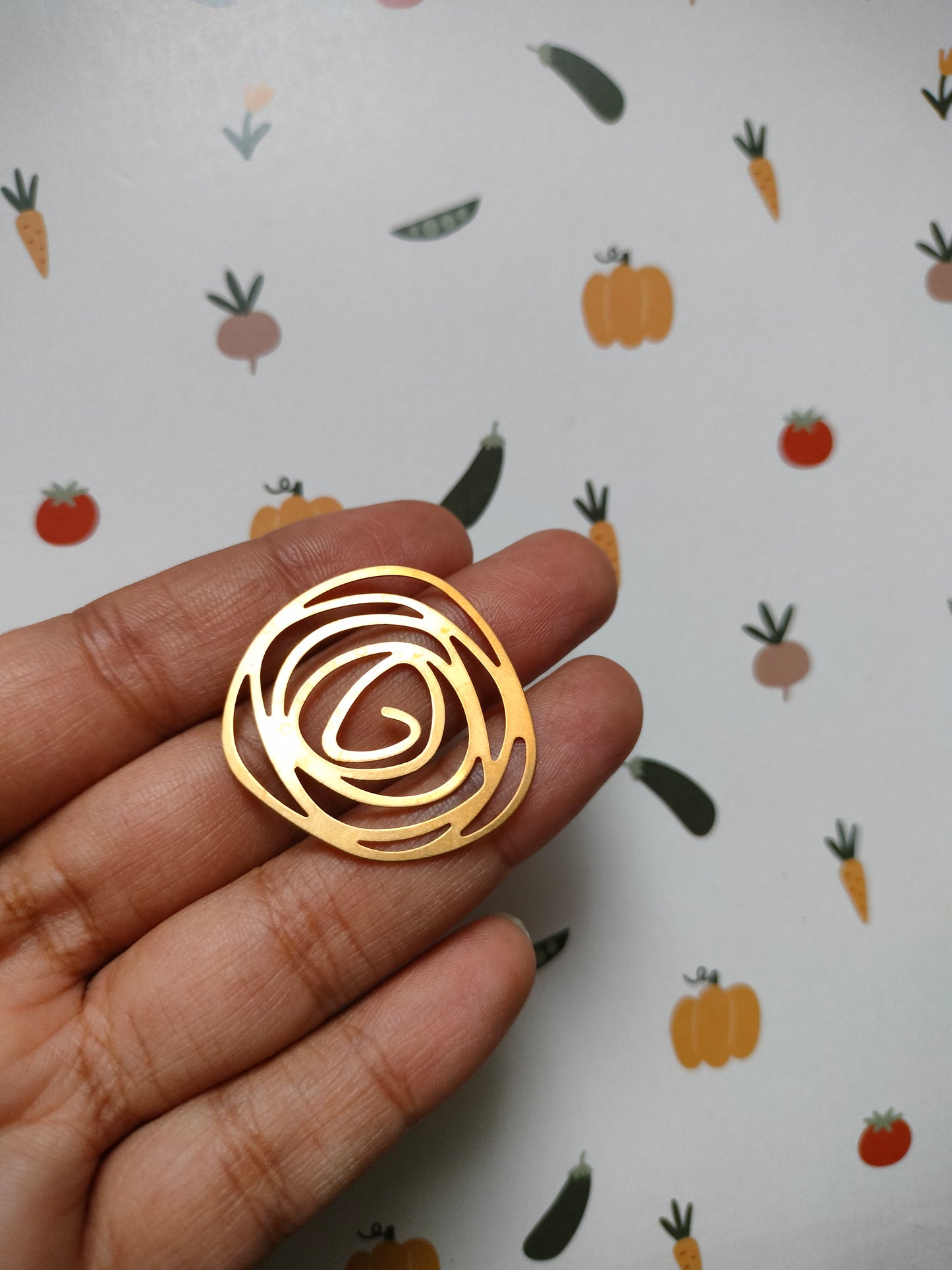 Whirlrose Brass Charm